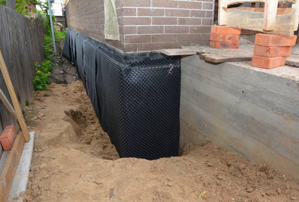 SJ Waterproofing Pros technician performing targeted Interior Drainage System assessment in Charleston, TN